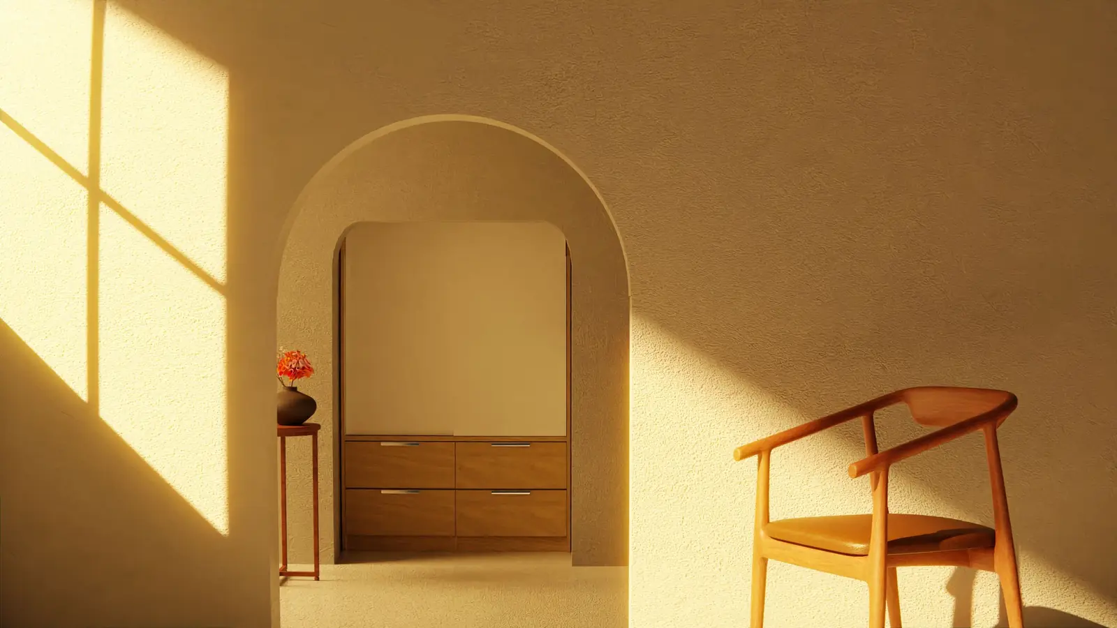 A minimalist interior showcasing a wooden chair and warm sunlight filtering through an archway.
